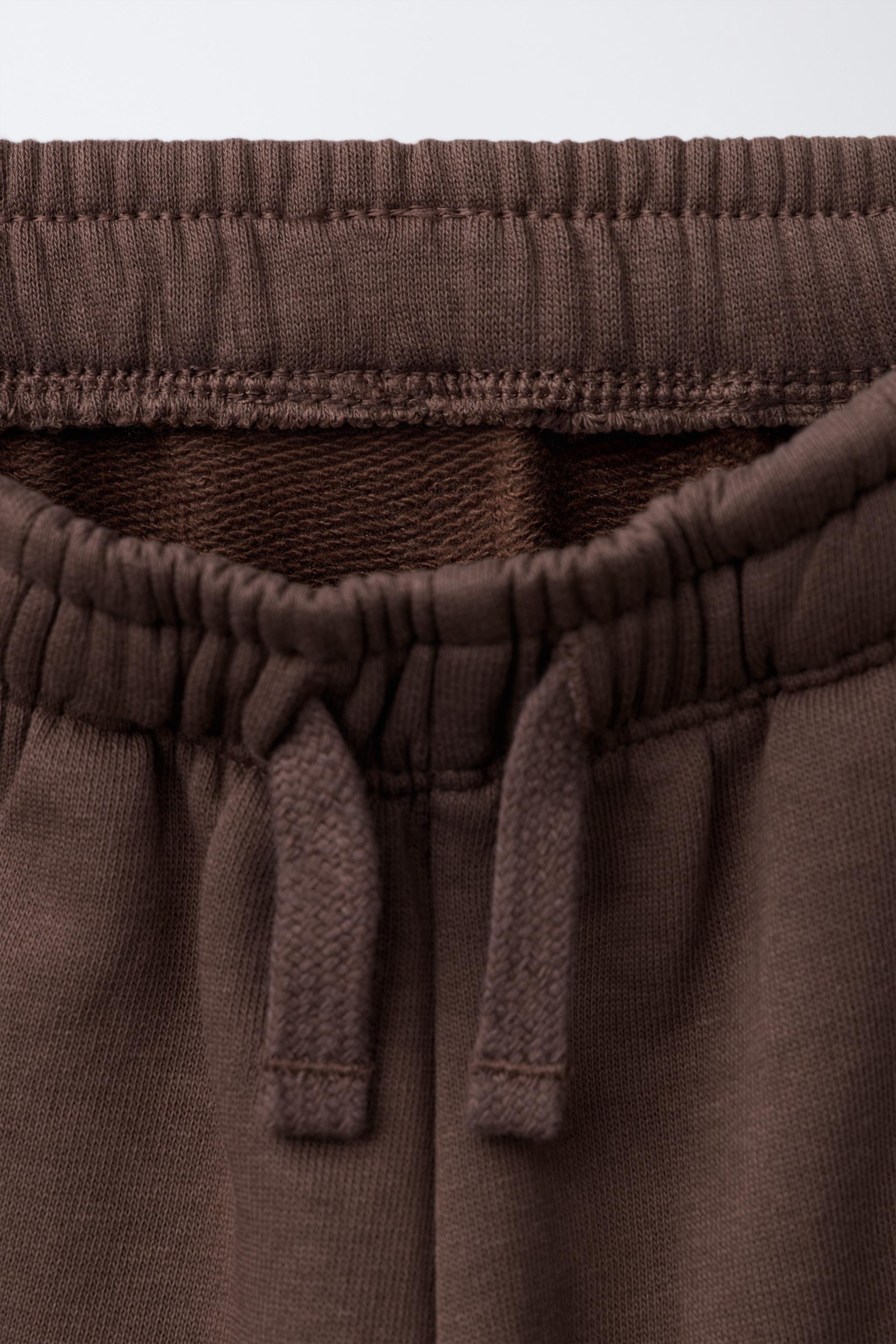 PANTALON DE JOGGING BRODÉ AVEC NUMÉRO ANIMAL